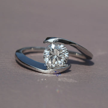 14kt white gold our solitaire ring features a round cut labgrown diamond adding a classic touch of timeless beauty Gurukrupa-Gems