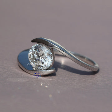 14kt white gold our solitaire ring features a round cut labgrown diamond adding a classic touch of timeless beauty Gurukrupa-Gems