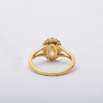 Adorn your finger with elegance in this oval cut diamond ring crafted in 14kt yellow gold with labgrown diamonds