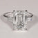 Best selling solitaire diamond ring in 14 kt white gold with vvs clarity diamonds in emerald and tapered baguette Gurukrupa-Gems
