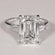 Best selling solitaire diamond ring in 14 kt white gold with vvs clarity diamonds in emerald and tapered baguette-Gurukrupa-Gems