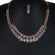 Elevate your neckline accessory in 14 kt rose gold lab grown baguette and round cut diamond necklace Gurukrupa-Gems