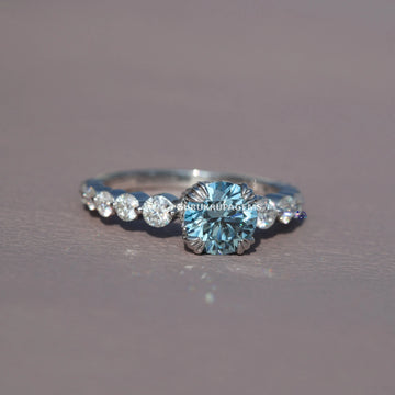 Fine Solitaire Jewelry crafted from 14 kt round cut blue treated diamond ring with vvs clarity Gurukrupa-Gems