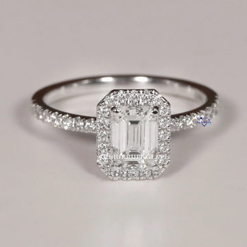 Make a bold impression with this 14 kt white gold emerald round cut ring with VVS clarity Gurukrupa-Gems