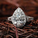 Style with elegance with this beautiful pear cut engagement ring crafted from lab grown diamonds in 14 kt white gold Gurukrupa-Gems