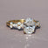 Stylishly crafted this unique oval and round cut diamond ring in 14 kt yellow gold lab grown diamonds Gurukrupa-Gems