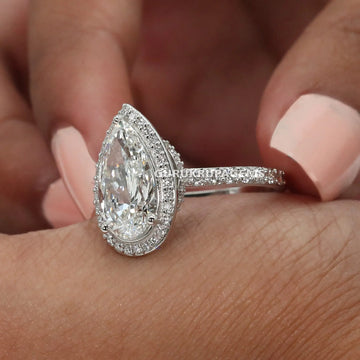 Surprise her with our 14kt white gold pear cut labgrown diamond engagement ring Gurukrupa-Gems