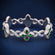 Infinity style green gemstone diamond bracelet - Gurukrupa-Gems