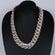 20 inch 20 mm presenting a white and yellow gold Cuban chain showcases VVS clarity Gurukrupa-Gems