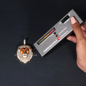A 14kt yellow gold lion head pendant with lab-grown diamond accents, epitomizing refined sophistication and personalized style