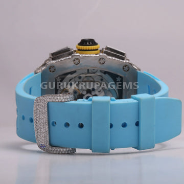 Crafting a chic and fashionable timepiece, the moissanite diamond watch boasts a stylish design with a blue rubber strap Gurukrupa-Gems