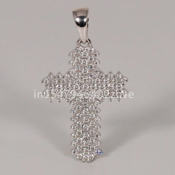 Elevate your faith with our stunning cross pendant crafted in 14kt white gold with flawless lab-grown diamonds