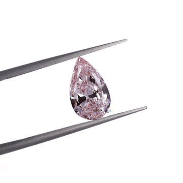 Highlighting our best-selling light pink pear shape loose diamond, renowned for its VVS clarity-Gurukrupa-Gems