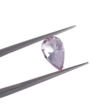 Highlighting our best-selling light pink pear shape loose diamond, renowned for its VVS clarity-Gurukrupa-Gems