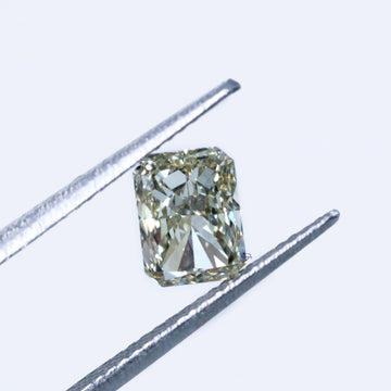 Meticulously crafted this Radiant Cut Light Yellow treated lab grown loose diamond with VVS clarity diamond-Gurukrupa-Gems